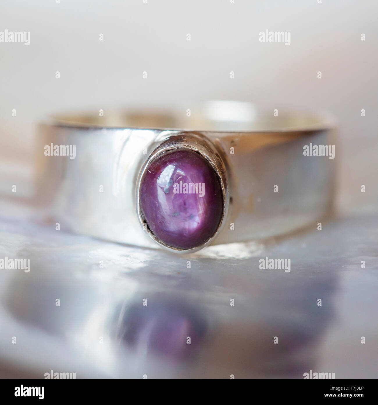 Beautiful silver ring with natural ruby star gemstone Stock Photo