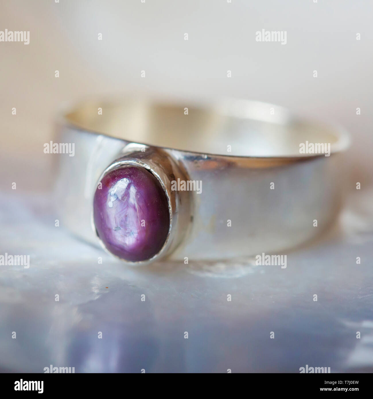 Beautiful silver ring with natural ruby star gemstone Stock Photo
