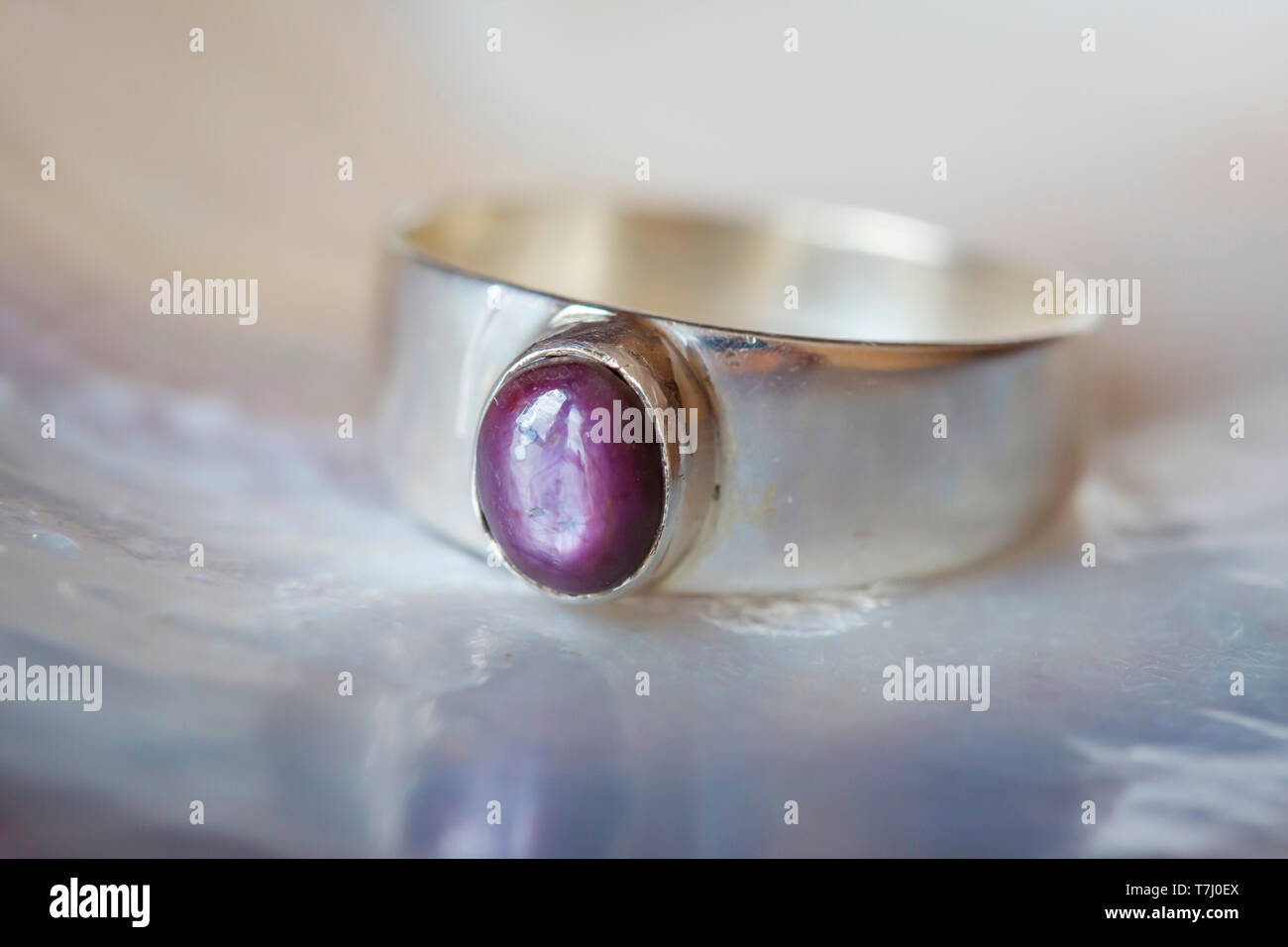 Beautiful silver ring with natural ruby star gemstone Stock Photo