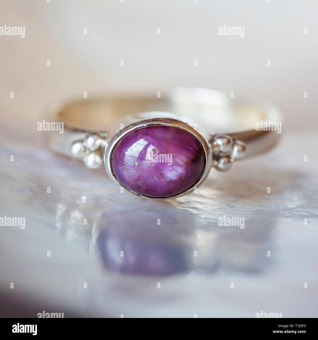 Beautiful silver ring with natural ruby star gemstone Stock Photo