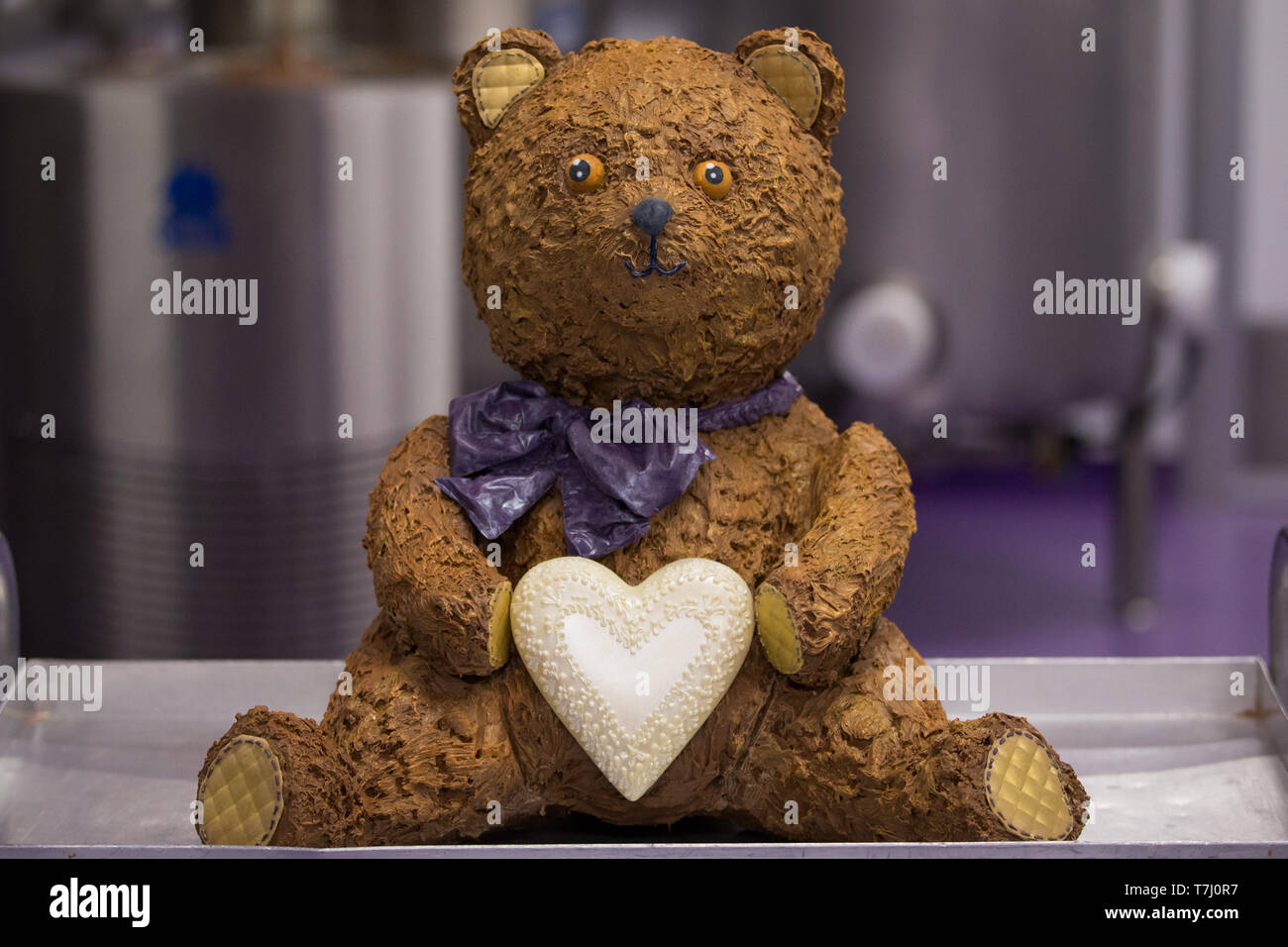 A giant chocolate teddy bear creation made for the announcement of a new royal baby at Cadbury World in Birmingham. Stock Photo