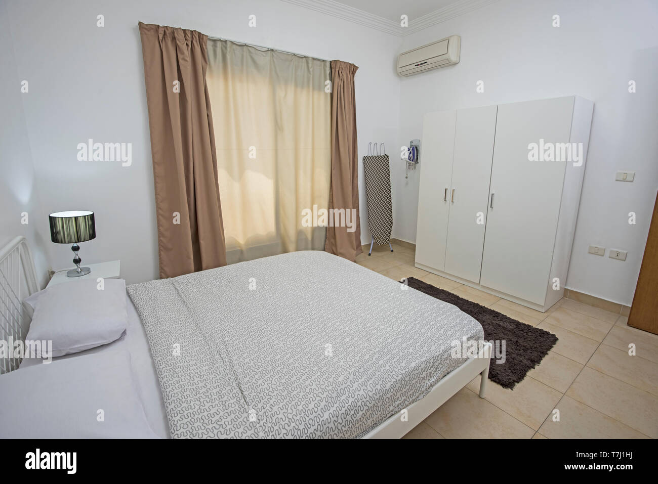 Double Bed In Bedroom Of Luxury Apartment Showing Interior Design