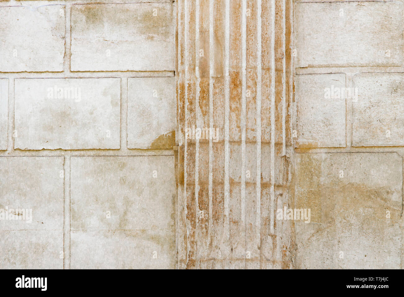 White classical columns and stone wall background Stock Photo - Alamy