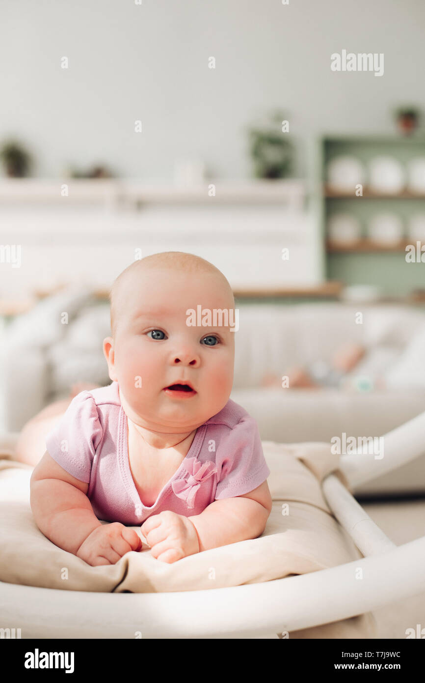 Little girl wearing clean clothes hires stock photography and images