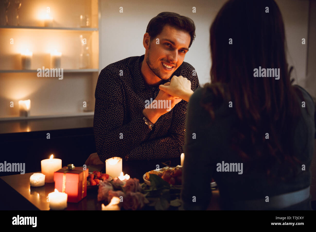 Man kissing hand hi-res stock photography and images - Alamy