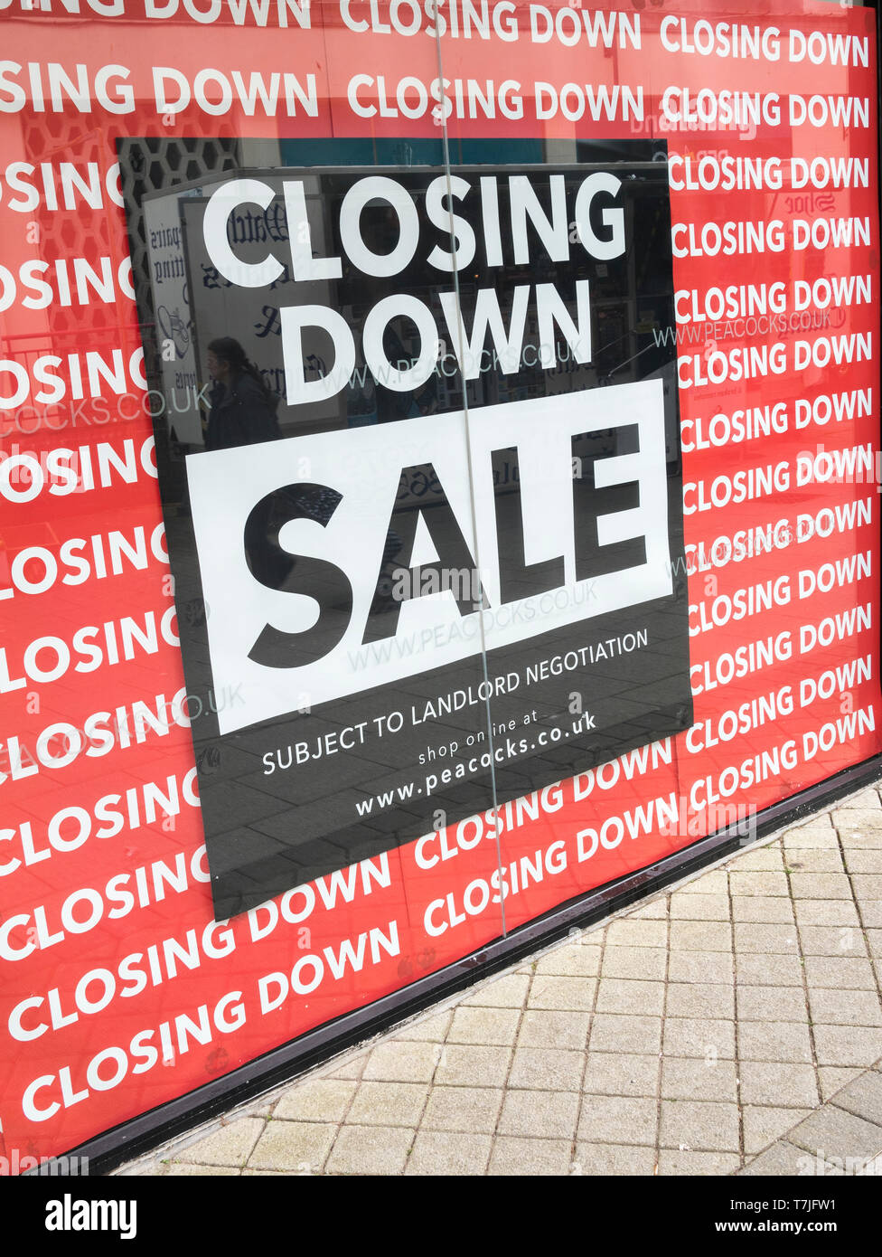 St Austell Peacocks shop Closing Down sign. For economic slow-down, falling sales, retail high street crisis, death of high street, winners and losers Stock Photo