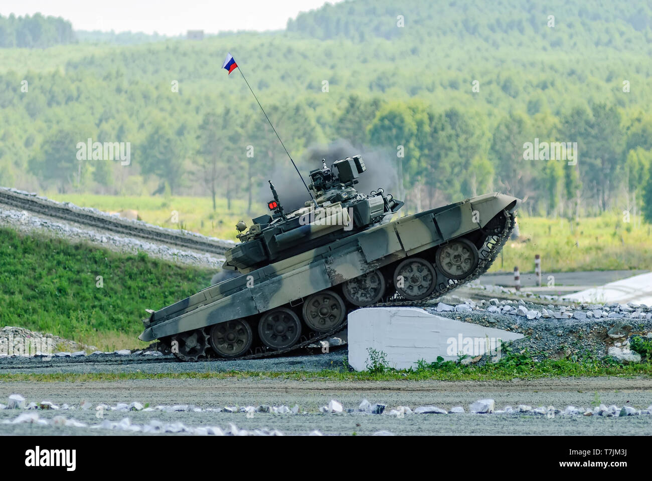 Nizhniy Tagil, Russia - July 12. 2008: Russian main battle tank T-80 on the ground in combat conditions. Display of fighting opportunities of arms and Stock Photo
