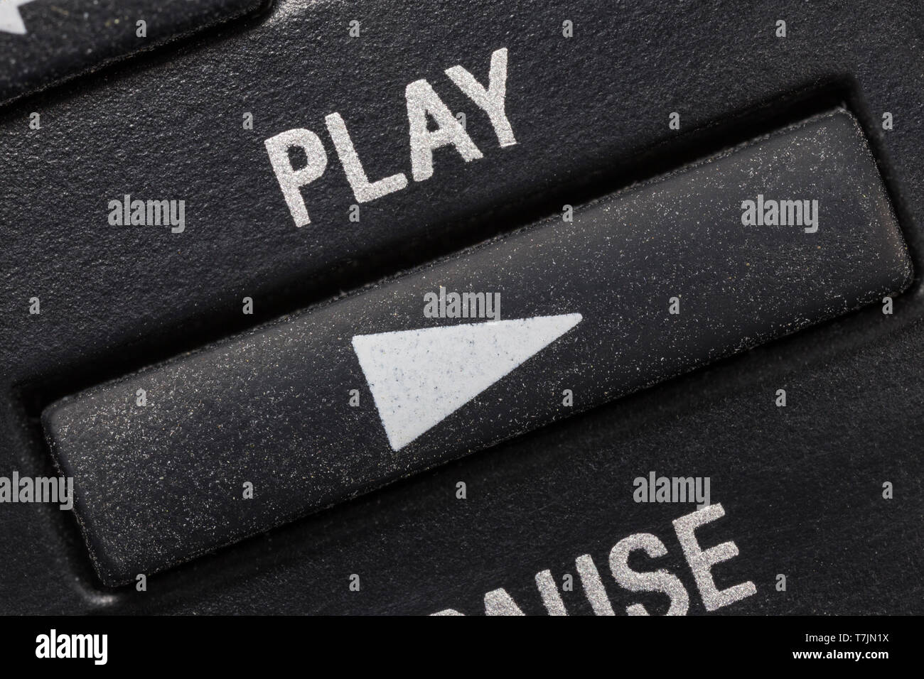 Television remote control play button macro close up detail. Stock Photo