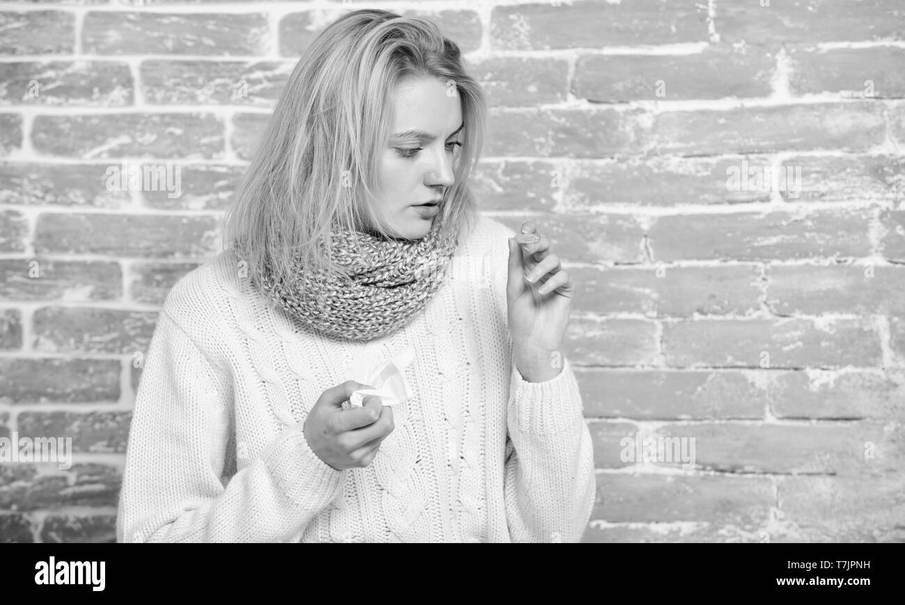 Checking body temperature. Cute ill girl measuring body temperature