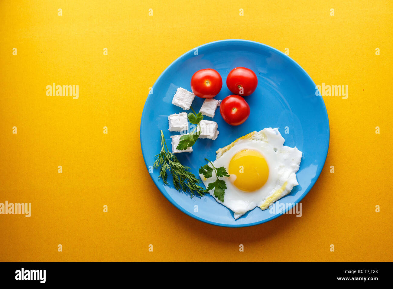 Turkish Breakfast on a blue plate on a bright yellow background Stock ...