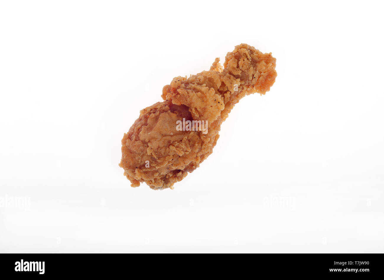 Deep fried crispy drumstick on white background Stock Photo