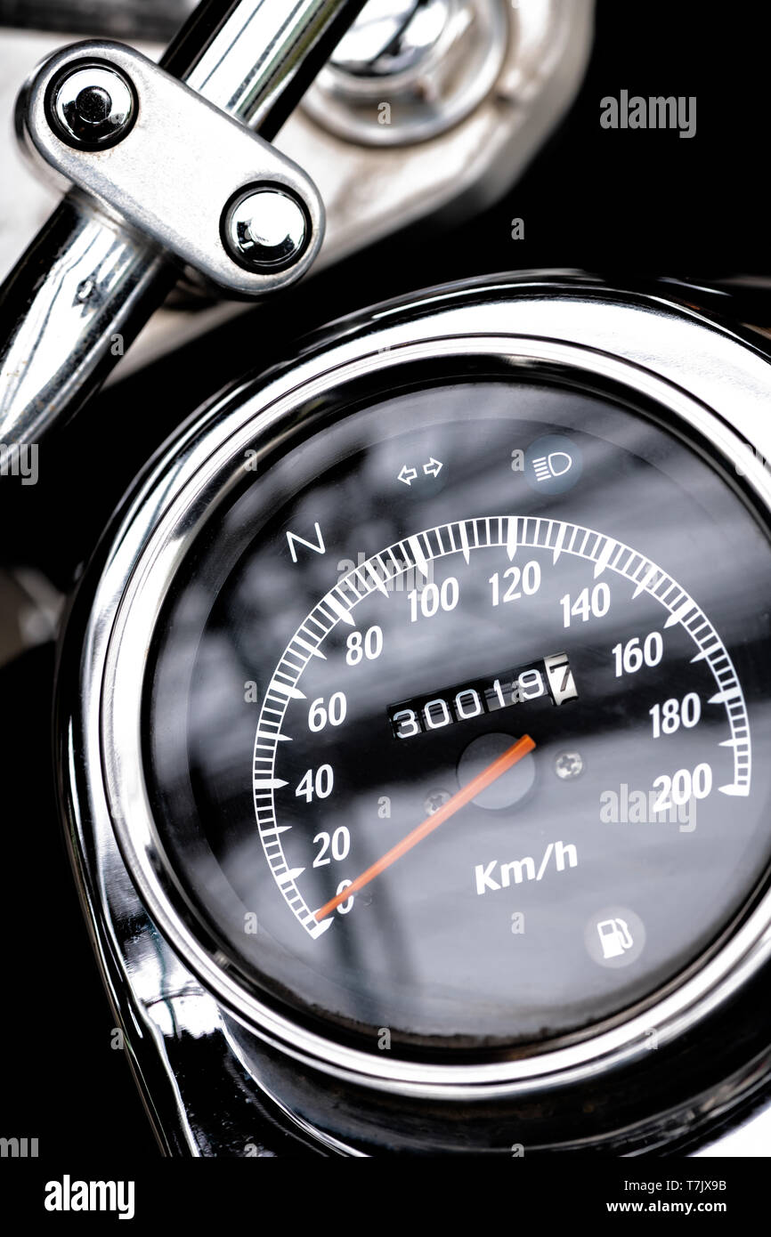 classic motorcycle mileage (dashboard , mileage) in white and black.classic motorcycle display