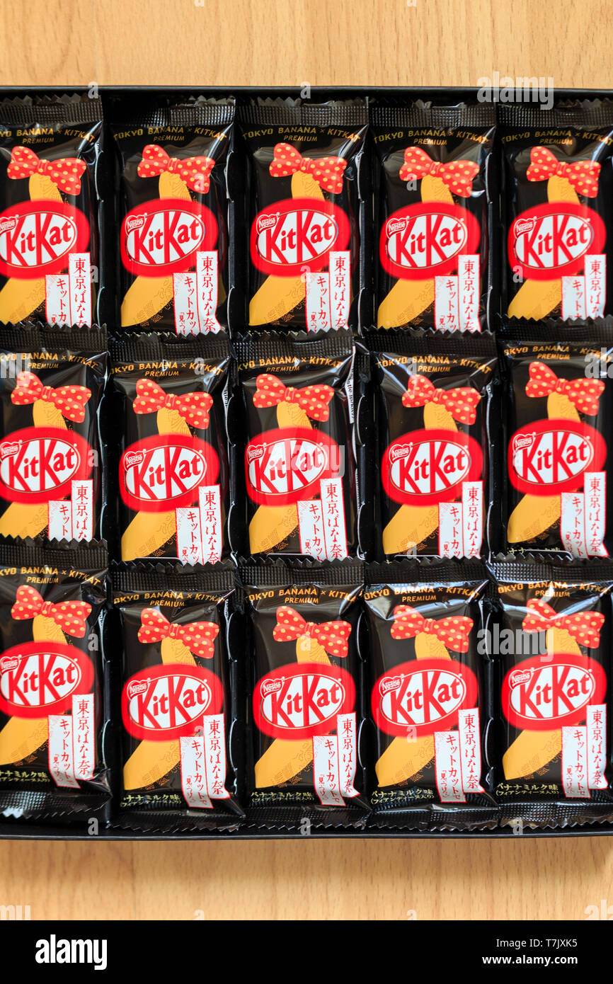 Interior of a carton box of Japanese Tokyo banana flavour Kitkats. Stock Photo