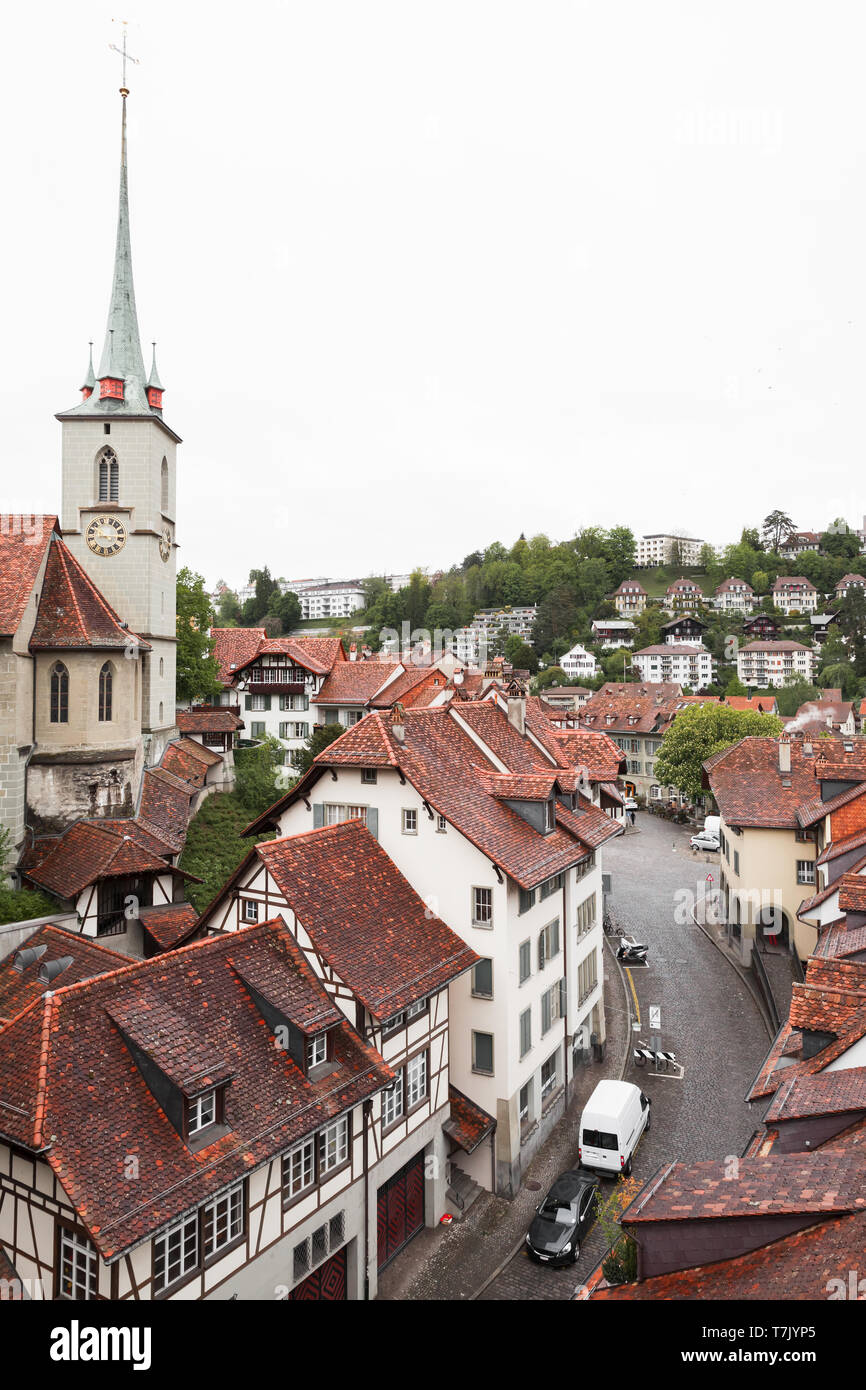 Bern old town, Switzerland. Cityscape with Nydeggkirche spire at cloudy day Stock Photo