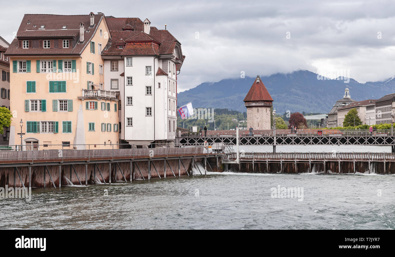 Lucerne cityscape with old dam and ancient Water Tower. Switzerland Stock Photo