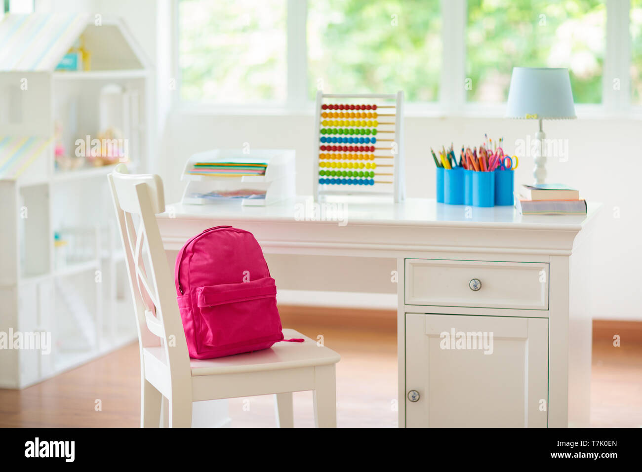 Kids Bedroom With Wooden Desk And Doll House White Sunny Room