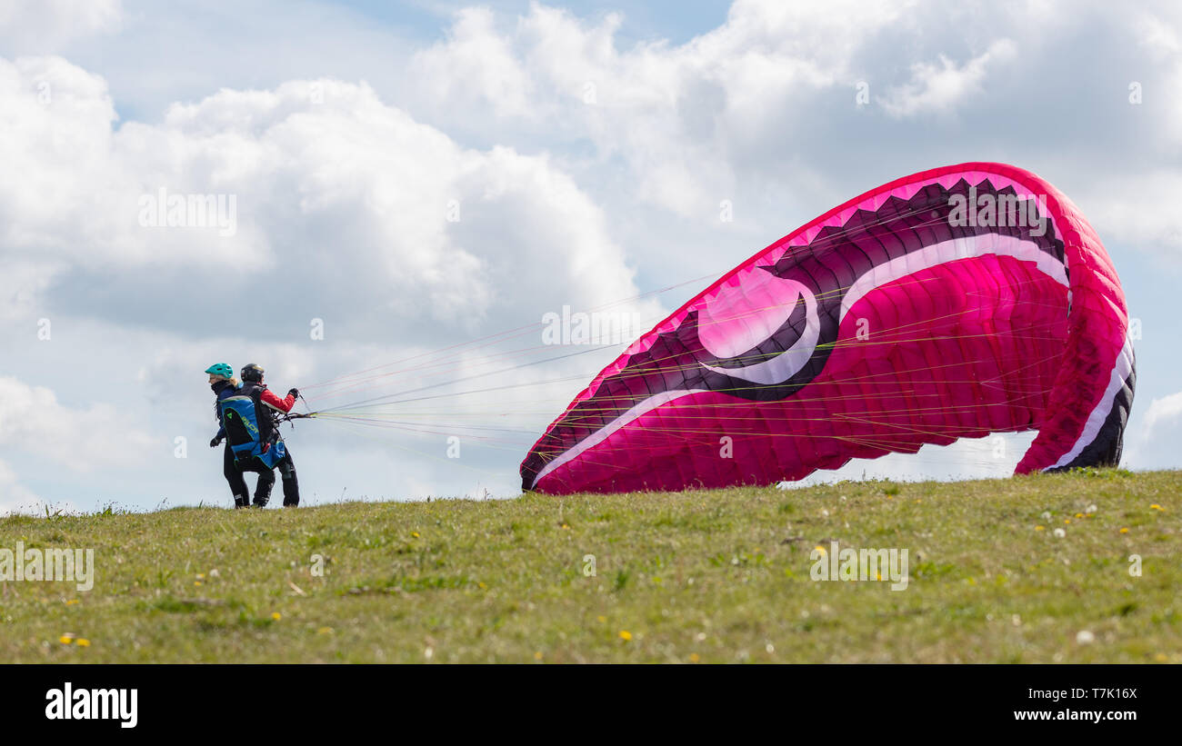 Devils Dyke, Sussex, UK; 6th May 2019; Male and Female Paragliders Attempting to Take Off From a Hillside Stock Photo