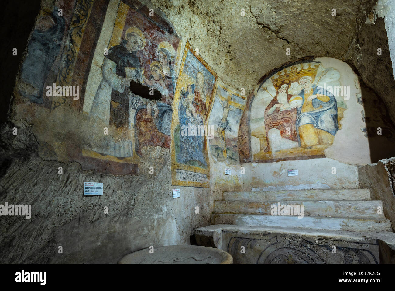 Ancient frescoes in rupestrian church saint Julian crypt. cave church. Matera Stock Photo