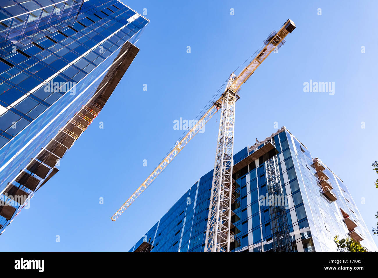 Crane and skyscrapers under construction in San Jose, South San Francisco bay area Stock Photo