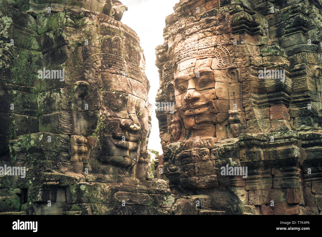 Faces carved in stone at Angkor, Cambodia Stock Photo