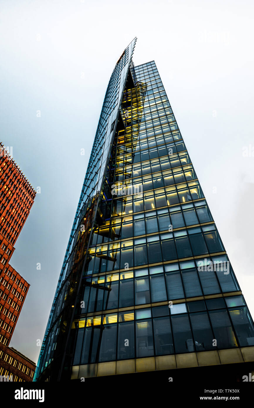 Berlin,Germany , August 21, 2018. Two modern high-rise buildings in the central square of the eurupean capital against the sky on a sunny day at sunse Stock Photo
