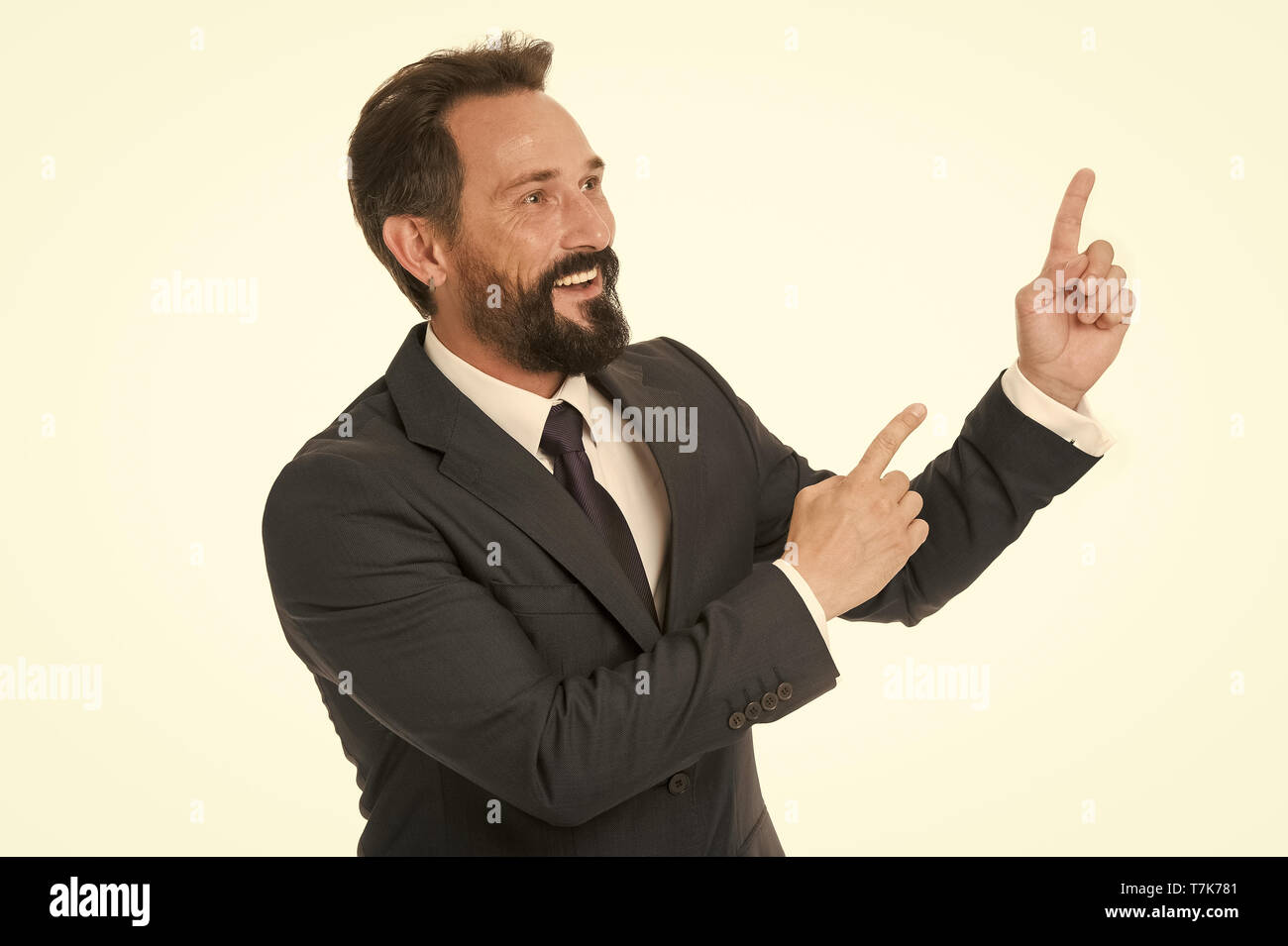Pointing direction. Man pointing index fingers isolated on white. Man ...