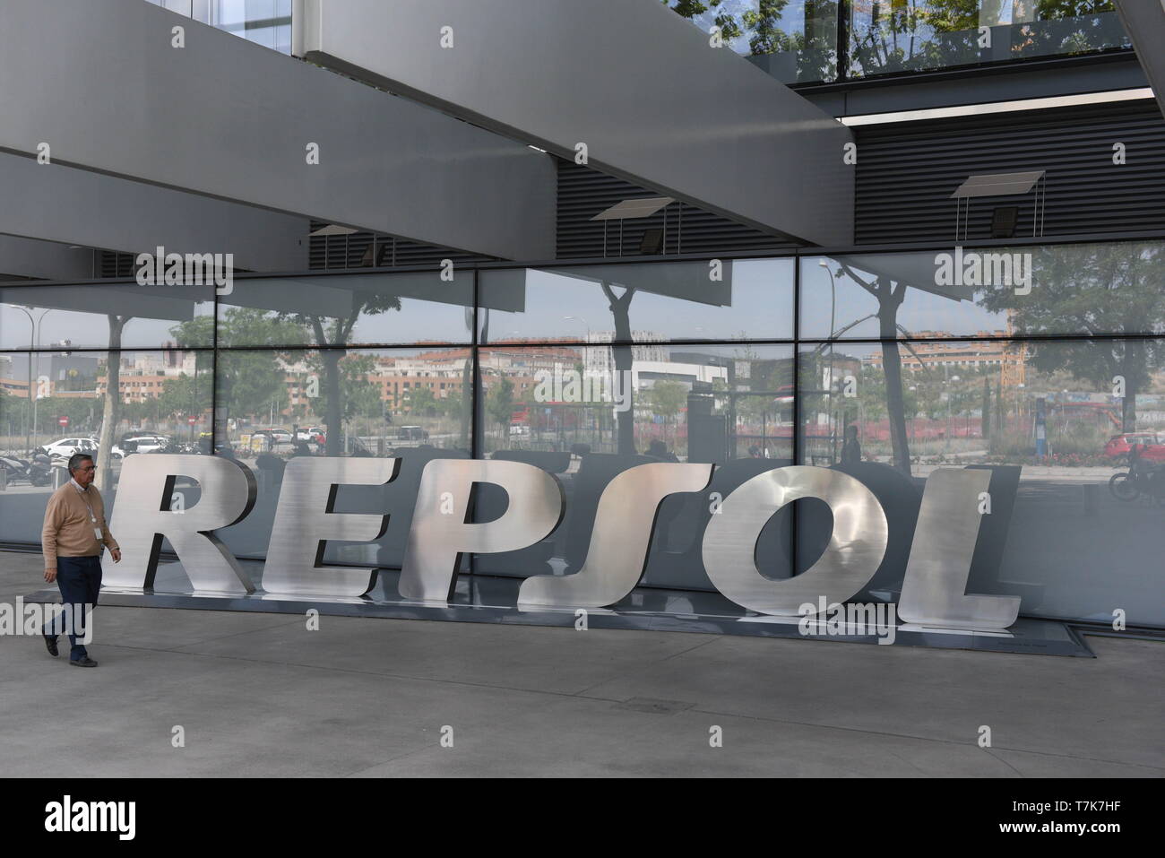 Madrid, Madrid, Spain. 7th May, 2019. A man is seen walking past the Repsol oil company headquarters in Madrid. Credit: John Milner/SOPA Images/ZUMA Wire/Alamy Live News Stock Photo