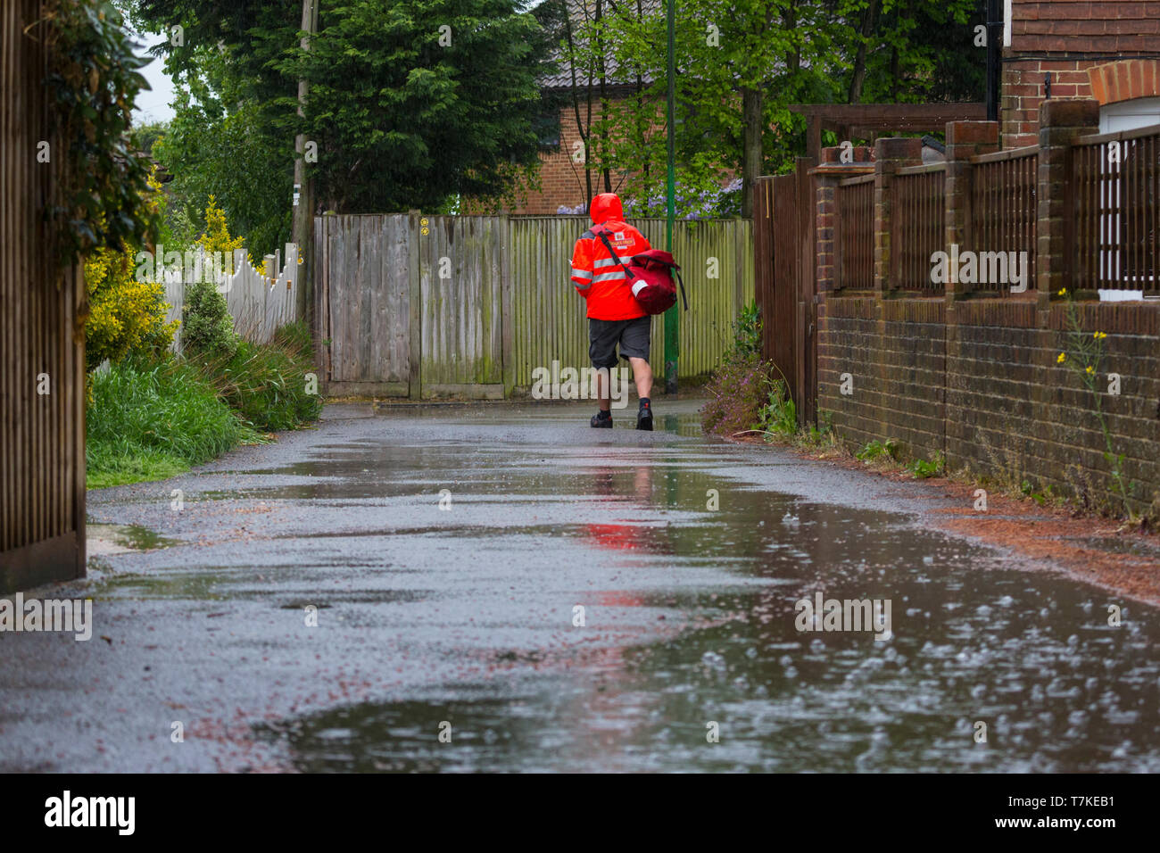 Postman uk rain hi-res stock photography and images - Alamy