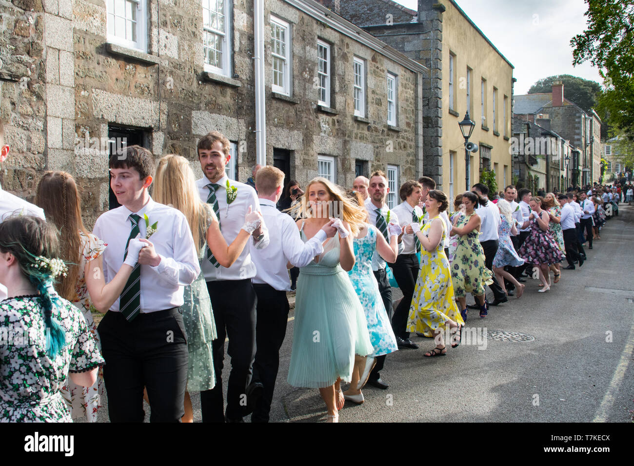Helston, Cornwall, UK. 8th May 2019. Helston Flora day annual spring festival. Seen here the 7am morning dance, which was originally for workers and servants to take part in before they had to attend to their duties.. Credit Simon Maycock / Alamy Live News. Stock Photo