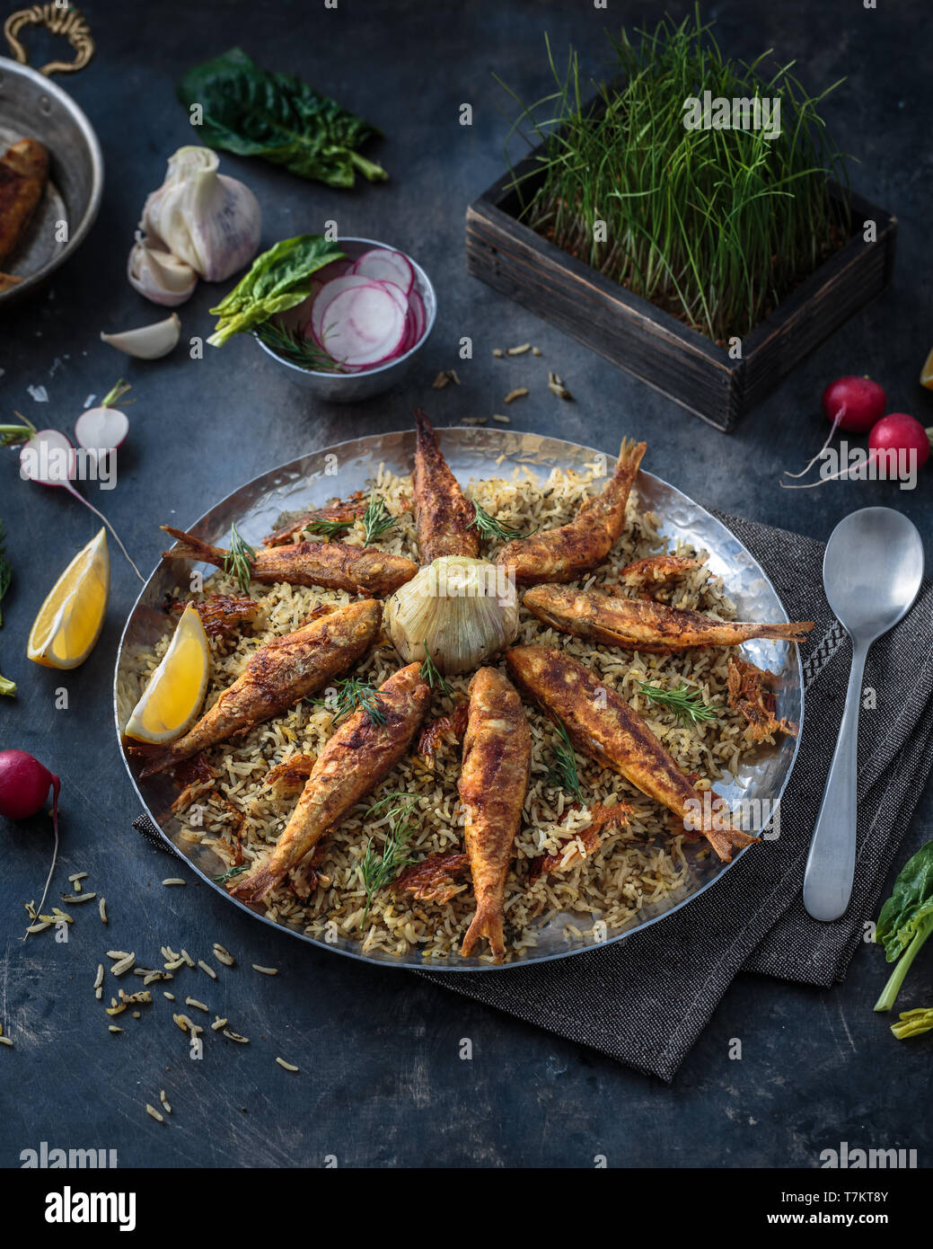 Rice pilaf with different herbs and fish. persian cuisine Stock Photo