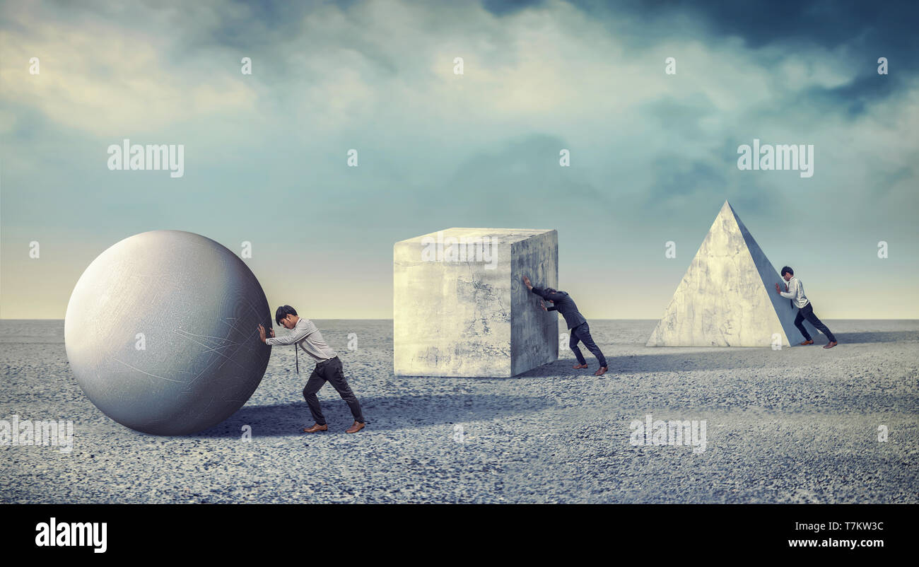 Businessman pushing the round large stone. Business heavy tasks and problems concept. differentiation between work Stock Photo