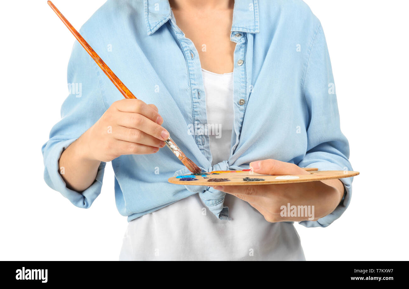 Female artist with palette and brush on white background Stock Photo ...