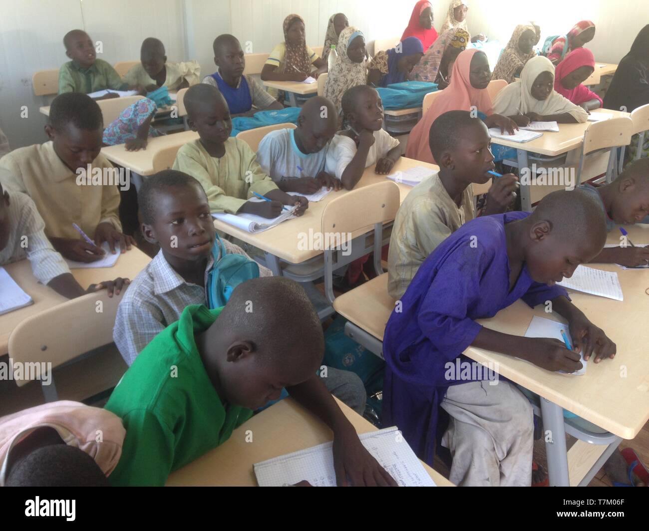 Children rescued from Boko Haram town attending school in IDP Center in Maiduguri Stock Photo