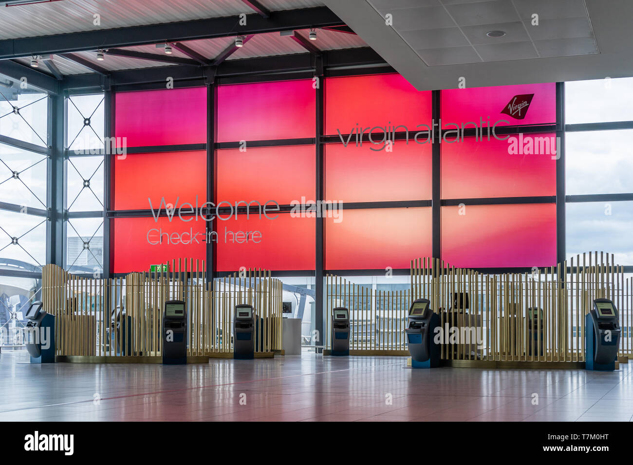 Automated check in area for Virgin Atlantic airline at Gatwick Airport, England, UK Stock Photo