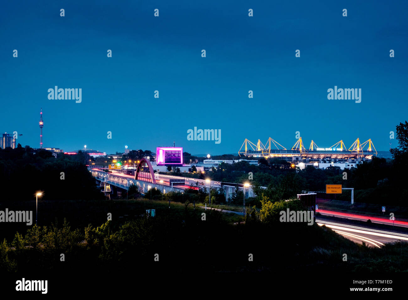 Skyline of Dortmund, with motorway A40 (Ruhrschnellweg, Westfalendamm) in the city of Dortmund as federal highway 1, football stadium Signal Iduna Park (Westfalenstadion), Westfalen Hall and TV tower Stock Photo