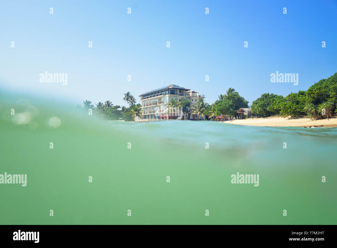 Sunny nature tropical island beach hi-res stock photography and images ...
