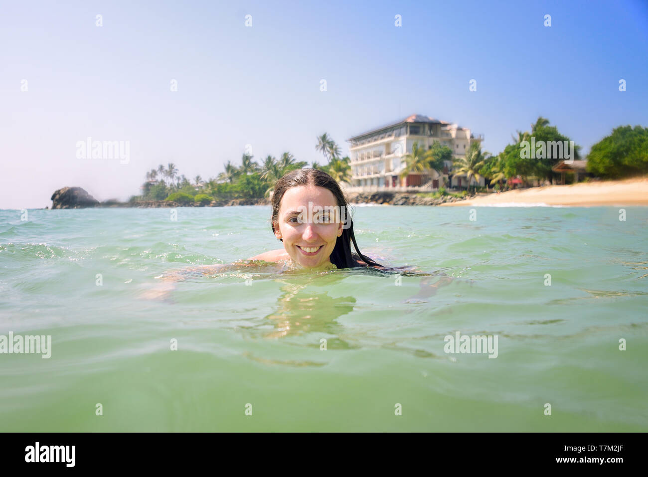 Woman bathing in the ocean Stock Photo Alamy