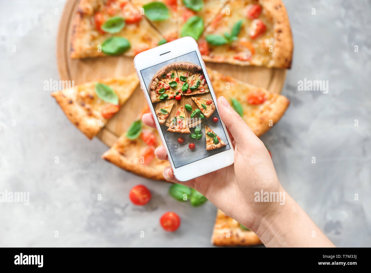 Woman hand taking slices delicious hi-res stock photography and images ...