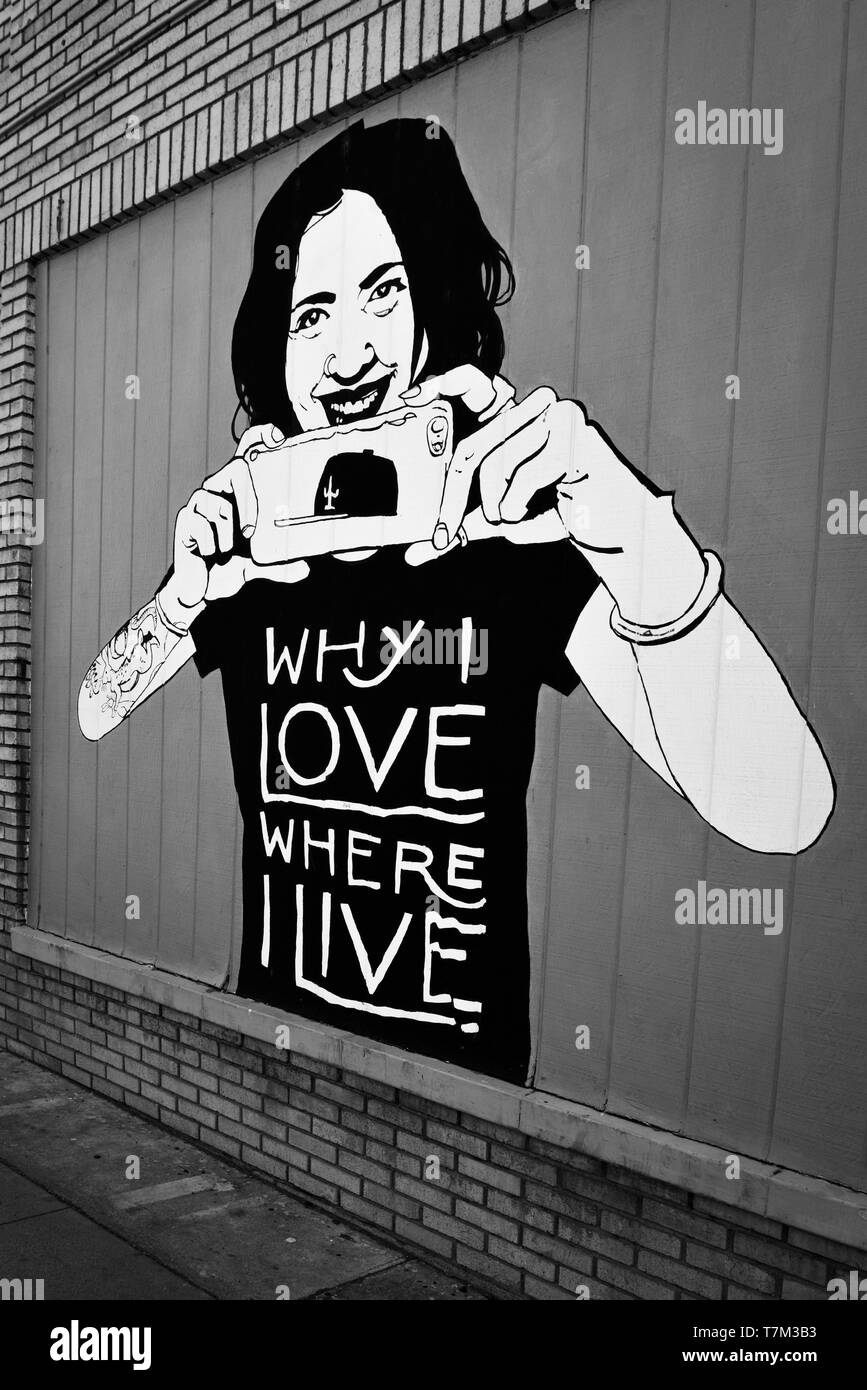 A mural commissioned by the 'Why I love where I live' brand in the downtown arts district in Tucson, AZ in black and white Stock Photo