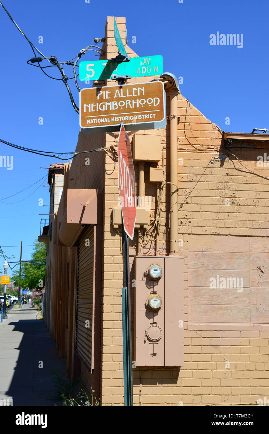 A National Historic District sign for the Pie Allen Neighborhood posted near a vintage building on 5th street in downtown Tucson, AZ Stock Photo