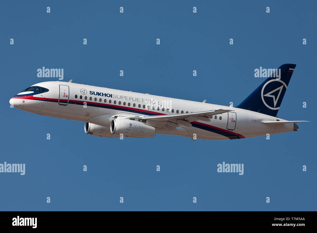 Bangalore, India - 02 11 2011: A Sukhoi Superjet 100 SJ100 performs a flying display at the Aeroindia Airshow Stock Photo