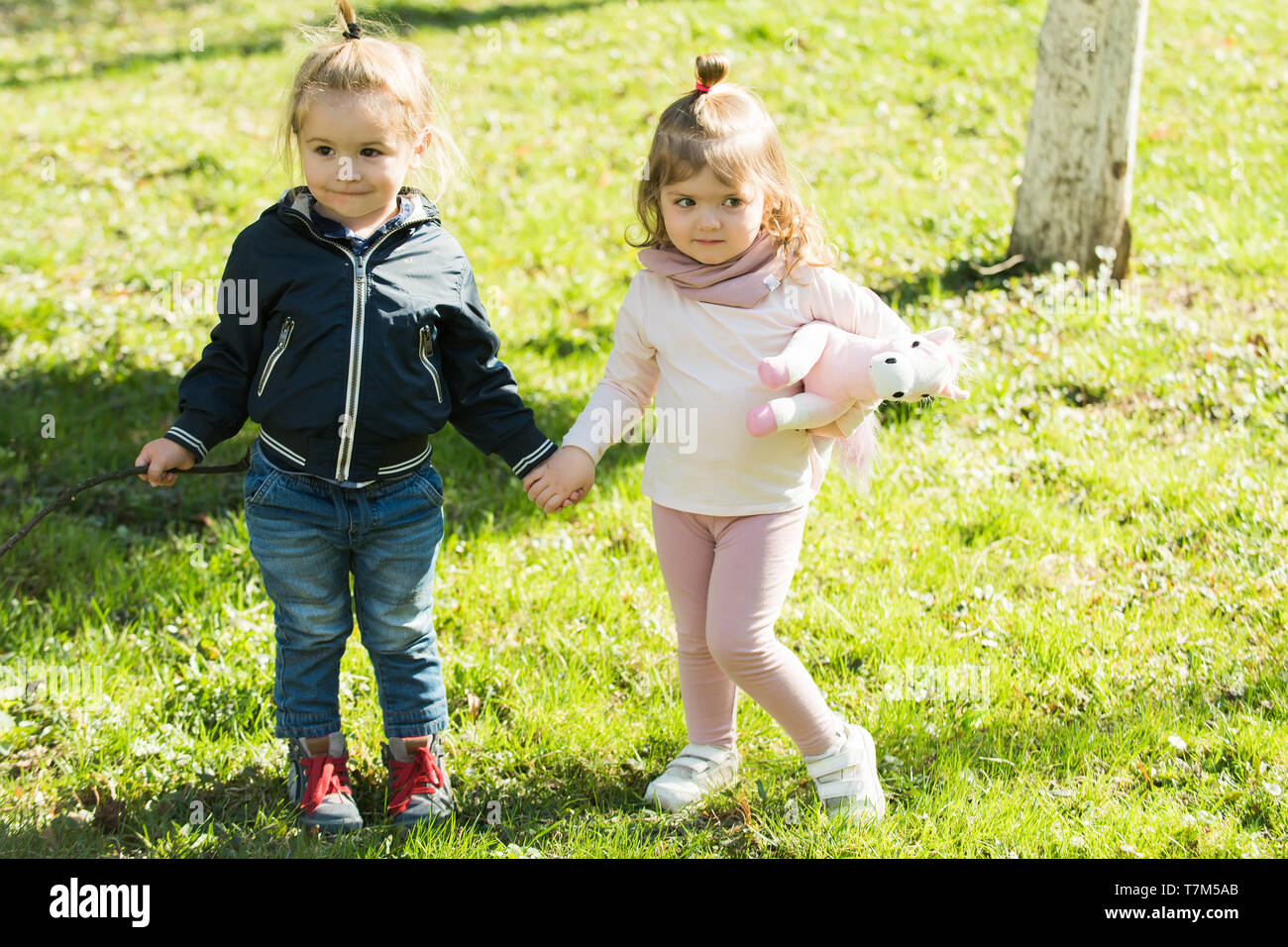 Baby Boy And Girl Holding Hands