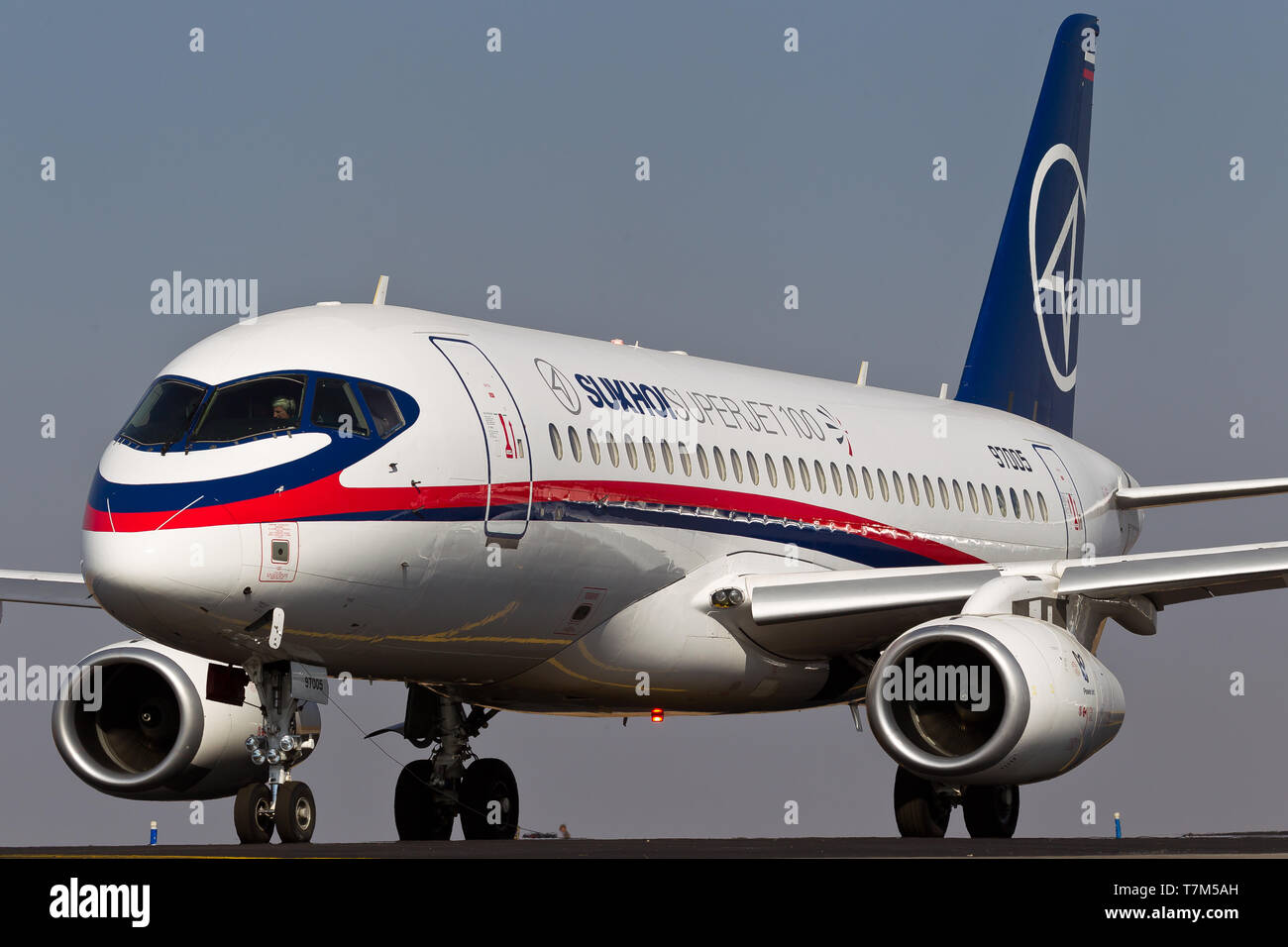 Bangalore, India - 02 11 2011: A Sukhoi Superjet 100 SJ100 performs a flying display at the Aeroindia Airshow Stock Photo