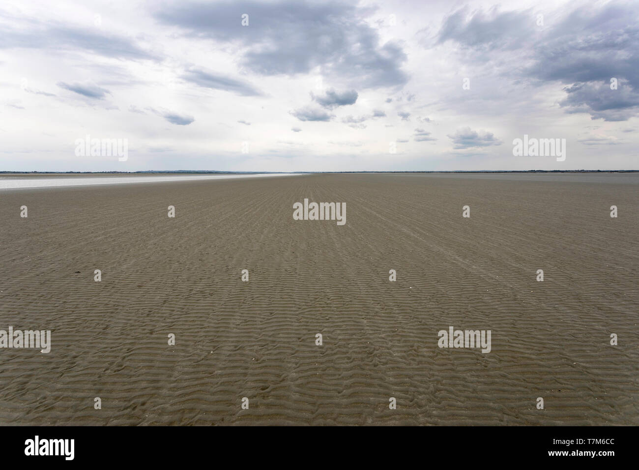 Sand at low tide in Mont saint Michel bay, Normandy, France Stock Photo
