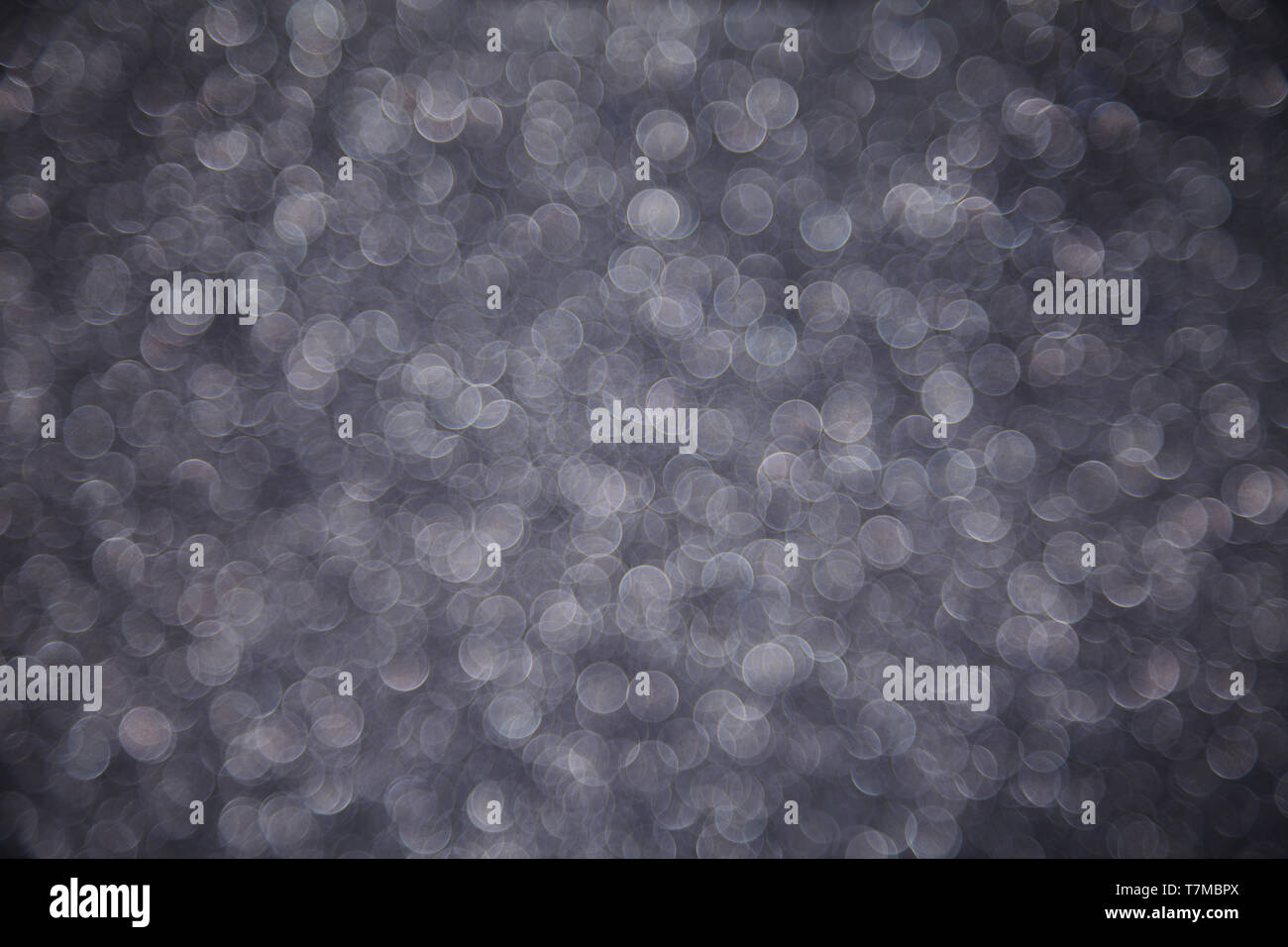 Black dark bokeh defocused background Stock Photo