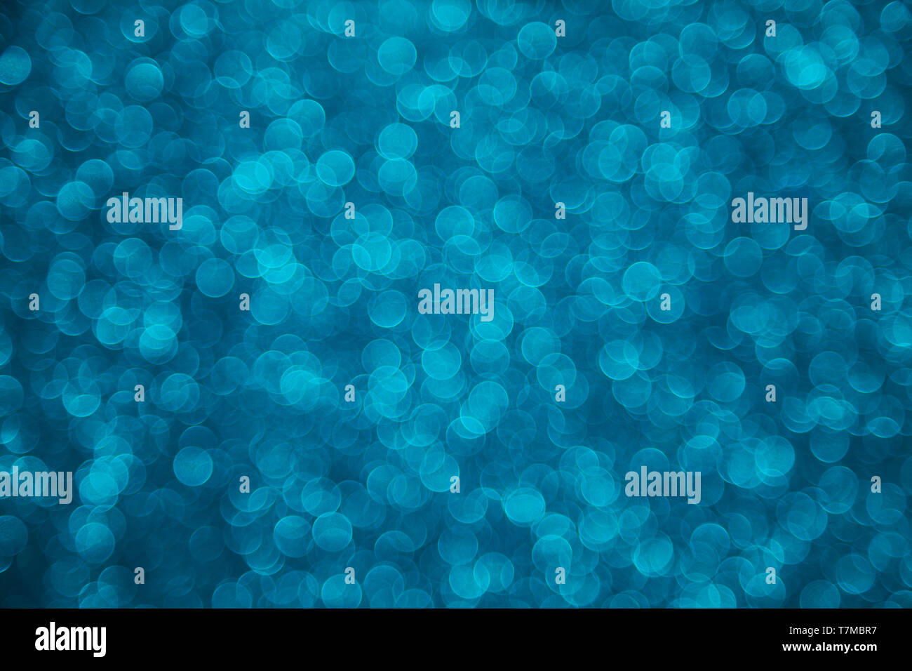 Turquoise blue teal bokeh defocused background Stock Photo