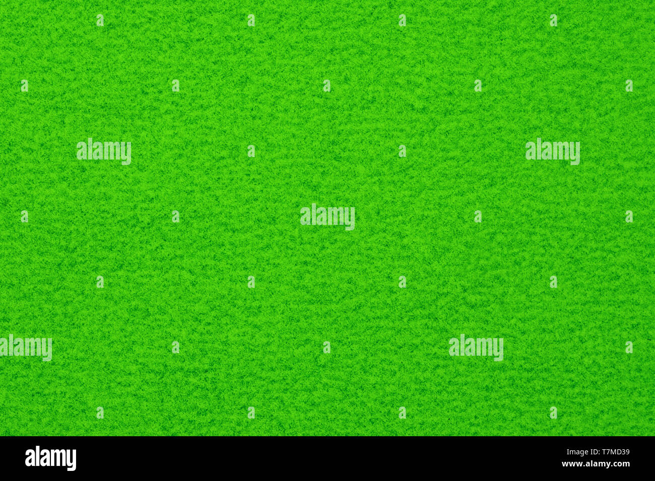 Green spotted surface close up. Texture and background Stock Photo