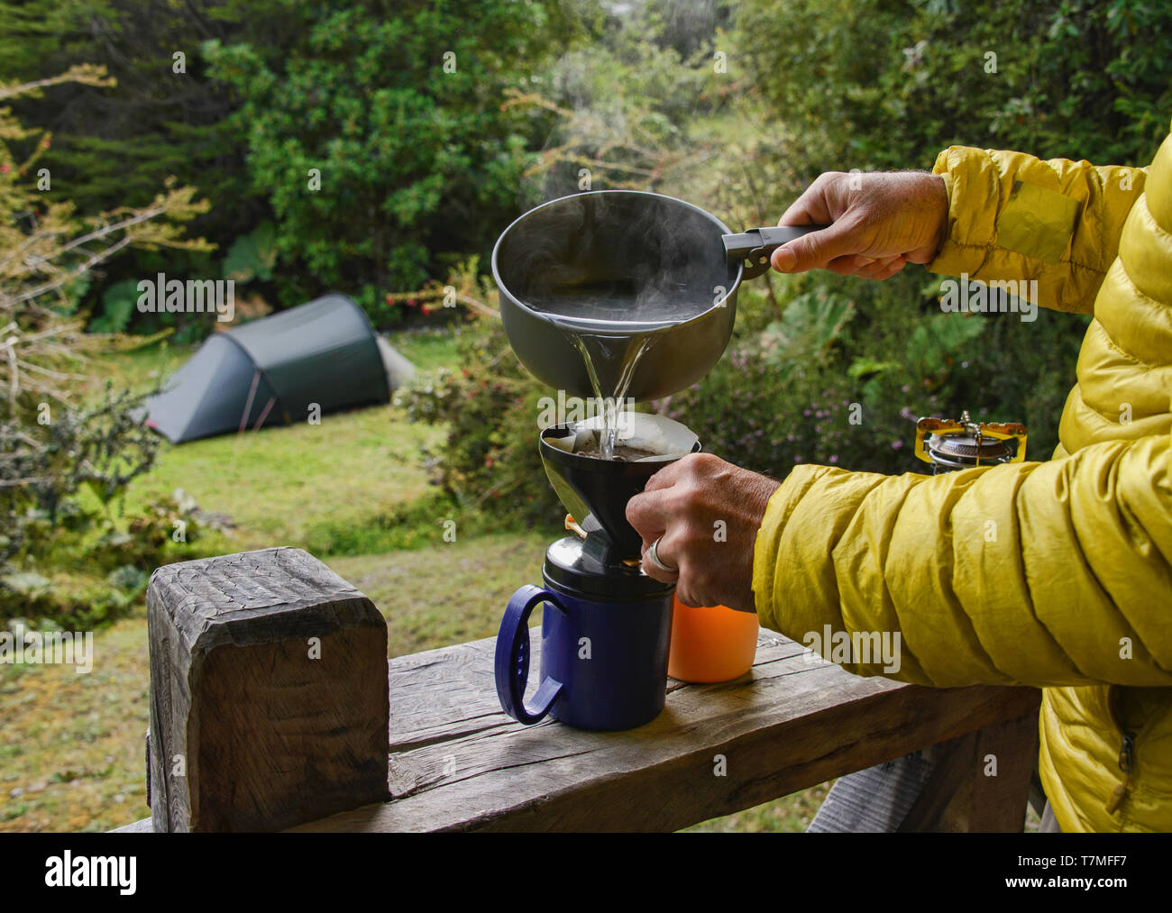 Brewing coffee at the campsite at Pumalin National Park, Patagonia, Region de los Lagos, Chile Stock Photo