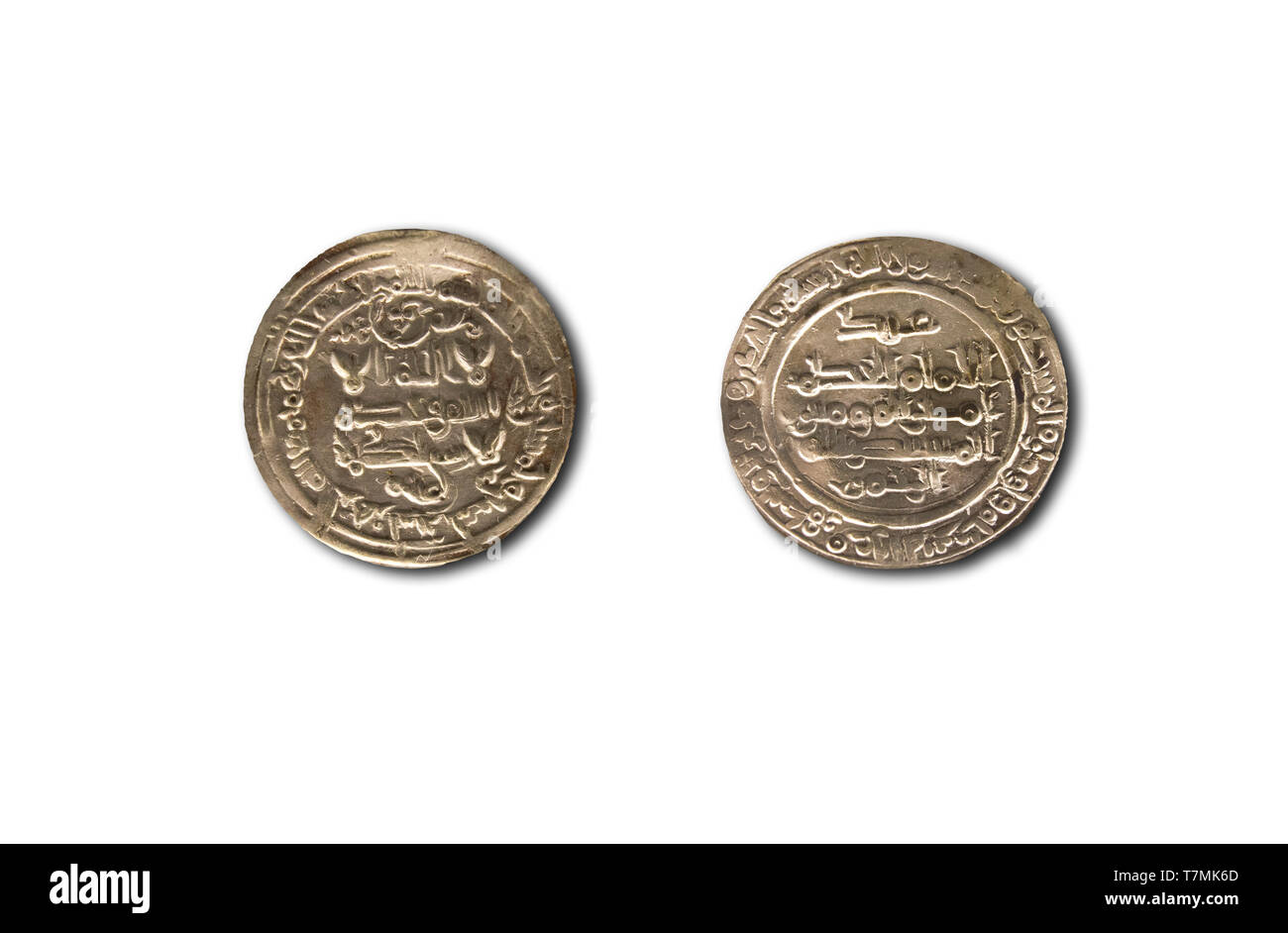 Silver dirhams from Cordoba Caliphate period, Al-Hakam II rule, 962 AC. Isolated Stock Photo