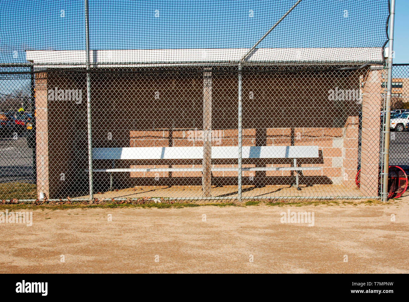 A local high schools softball dugout Stock Photo